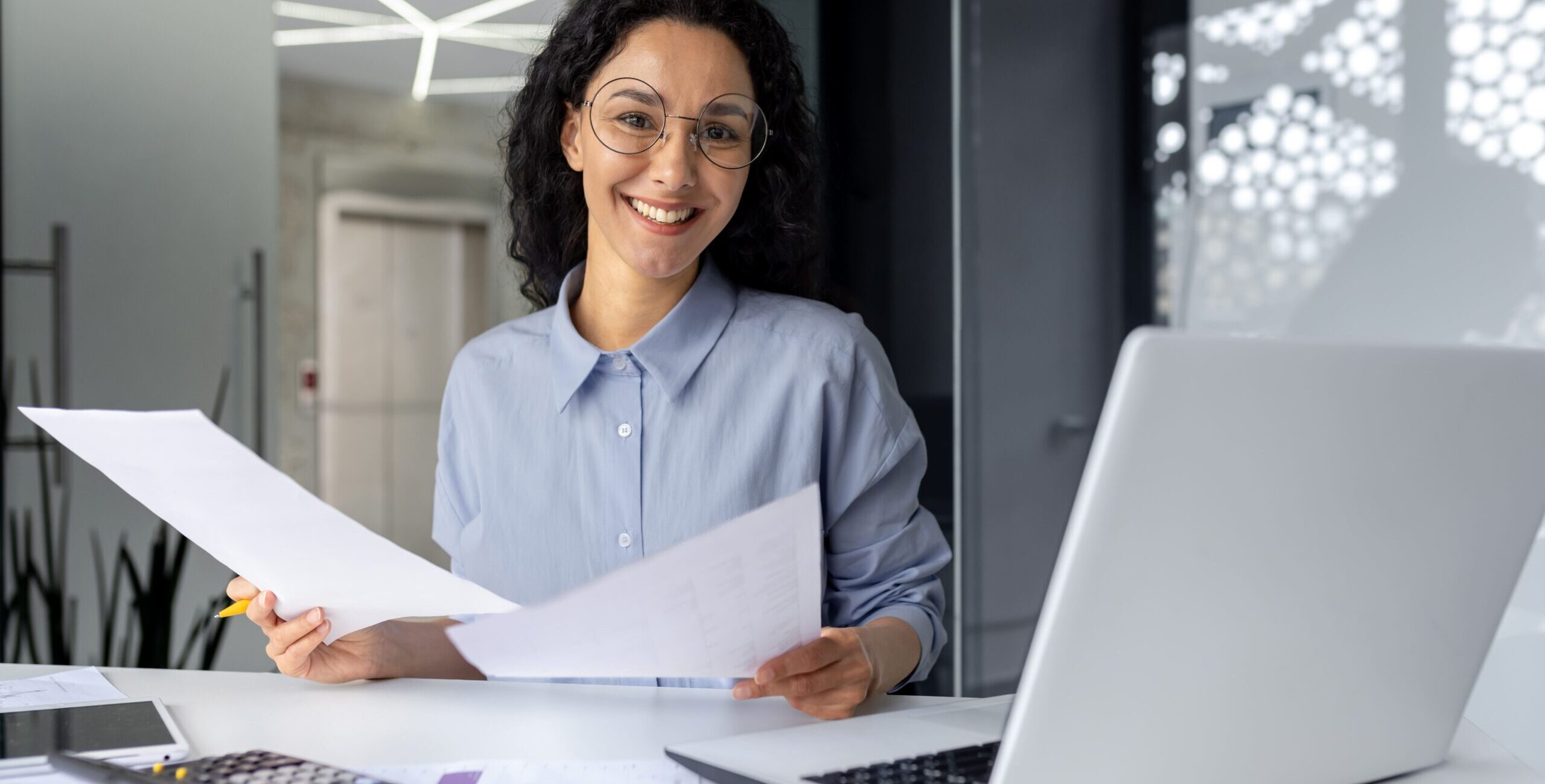 portrait-of-happy-and-successful-financial-woman-a-2023-11-27-04-55-53-utc (1)